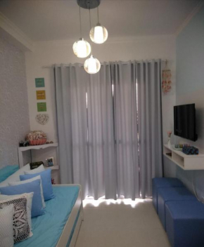 Lindo apartamento com ar, piscina, wi-fi, varanda gurmet, a 1km da praia Grande